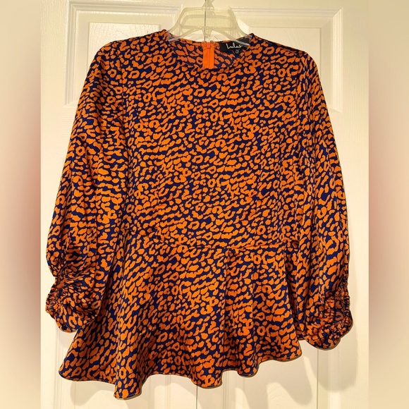 LULUS Color Me Wild Orange and Navy Blue Leopard Print Peplum Top size M. NWOT - Picture 2 of 12